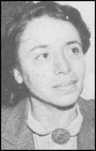 Louise Thompson Patterson, a Black woman, wears a collared shirt and broach and looks off to the upper right.