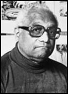<p>Ollie Harrington (1912-1995) was born in Valhalla, New York, a town whose name from Germanic mythology accidentally predicted his three decades of exile in East Germany. A visual artist whom Langston Hughes praised as “America’s greatest African-American cartoonist,” Harrington was also a significant political essayist and literary inspiration. In 1935, the Harlem <em>Amsterdam News </em>began running his comic strip <em>Dark Laughter</em>, its title signifying on Sherwood Anderson’s Negrophilic novel of 1925. Bootsie, the strip’s regular focus, was an African American everyman who remained Harrington’s most popular spokesman. “Jolly, rather well fed, but soulful,” as Harrington described him, Bootsie was in all three respects similar to his creator. In 1951, inspired in part by intrusive FBI surveillance, Harrington moved to Paris and became Richard Wright’s closest companion in a black expatriate community including James Baldwin, Chester Himes, and William Gardner Smith, all of whom drew on aspects of Harrington’s character in their Paris-set novels. When Wright died suddenly in 1960, Harrington suspected an assassination by the FBI and/or CIA. American-made “cloak-and-dagger terrorism,” Harrington believed, had doomed “the climate around the expatriate Paris community.” Moving even further toward the political left, Harrington requested political asylum in Communist East Germany in 1961. Harrington’s published writing, some of it produced as an international correspondent for the <em>Pittsburgh Courier</em>, includes <em>Terror in Tennessee: The Truth about the Columbia Outrages </em>(1946) and the posthumous collection <em>Why I Left America and Other Essays </em>(1993). The FBI returned Harrington’s deep suspicion with a file stretching half a century, all the way from 1951 to 2002.</p>