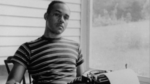 <p>Ralph Ellison (1914-1994), born in Oklahoma City, Oklahoma, published only one novel during his lifetime. But what a novel it was: the densely symbolic, historically sweeping, and boldly surrealistic <em>Invisible Man </em>(1952) altered the course of African American writing in every genre and has been ranked by the Modern Library as one of the top twenty English-language novels of the twentieth century. “I am an invisible man,” declares Ellison’s self-conscious, hyper-articulate narrator in the novel’s memorable opening line, “not a spook like those who haunted Edgar Allen Poe; nor am I one of your Hollywood movie ectoplasms.  I am a man of substance, of flesh and bone, fiber and liquids —and I might even be said to possess a mind.   I am invisible, understand, simply because people refuse to see me.” While he never completed <em>Invisible Man</em>’s intended follow-up, the novel posthumously published as <em>Juneteenth </em>(1999), Ellison also never stopped writing, publishing short fiction and brilliant essays on jazz music, nineteenth-century American literature, the interracial porousness of officially segregated U.S. culture, and <em>Invisible Man </em>itself, which he interpreted and defended, again and again, in the lectures and articles collected in <em>Shadow and Act </em>(1964) and <em>Going to the Territory </em>(1986). Unlike that of most of his audience, the FBI’s interest in Ellison was not fixated on <em>Invisible Man</em>. His Bureau file was opened before this novel was published, and it busied itself with the security challenges of his White House visits and American Academy in Rome fellowships. Had Ellison publicized the initial drafts of <em>Invisible Man</em>, however, the FBI’s stance might have been different. In one version of this Great African American Novel, the transparent narrator dreams of faithful service under “a master FBI man,” an unconscious confession of blindness that also divulges repressed ties between the mask of black servility and the loyal-American disguise of the G-Man.</p>