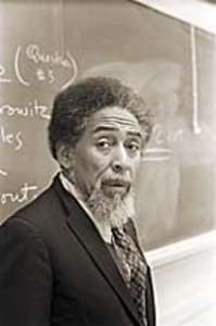 <p>The son of a Barbadian father who organized for Marcus Garvey’s Universal Negro Improvement Association (UNIA), St. Clair Drake (1911-1990) attended Hampton University and participated in its pitched student strike of 1927, the training ground for a surprising number of New Negro intellectuals. An English minor and the editor of the Hampton student newspaper, Drake took his literary talent with him while studying anthropology and sociology at the University of Chicago, the home of the influential “Chicago School” of urban ethnography. While still a Ph.D. candidate, he and Horace R. Cayton coauthored the classic <em>Black Metropolis: A Study of Negro Life in a Northern City </em>(1945), an 830-page survey of Bronzeville whose inspiration to imaginative writers was predicted by its introduction by Richard Wright. Speaking as a fellow black Chicagoan, Wright praised the book as “a landmark of research and scientific achievement” and as an explanatory key to his novel <em>Native Son </em>(1940). Drake’s significance was not confined to sociology and its effects on the realist fiction of the Chicago Renaissance. He was also a dedicated Pan-Africanist who advised Kwame Nkrumah and other post-independence African leaders, and he built a model center for Black Studies at Stanford University starting in 1969. Drake’s 335-page FBI file, constructed between 1961 and 1971, is especially concerned with his African contacts.  </p>